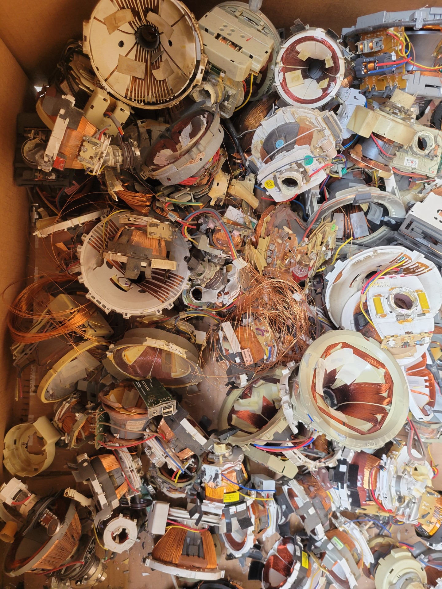 Copper coils recovered from electronic equipment