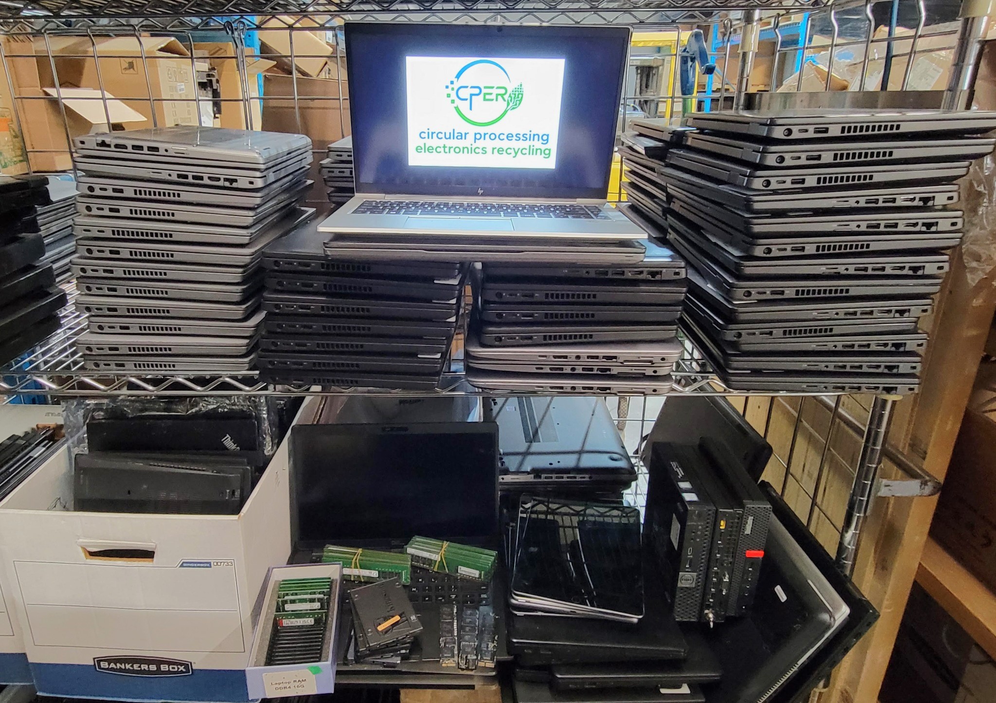 Reusable laptops and electronics prepared inside the CPER warehouse